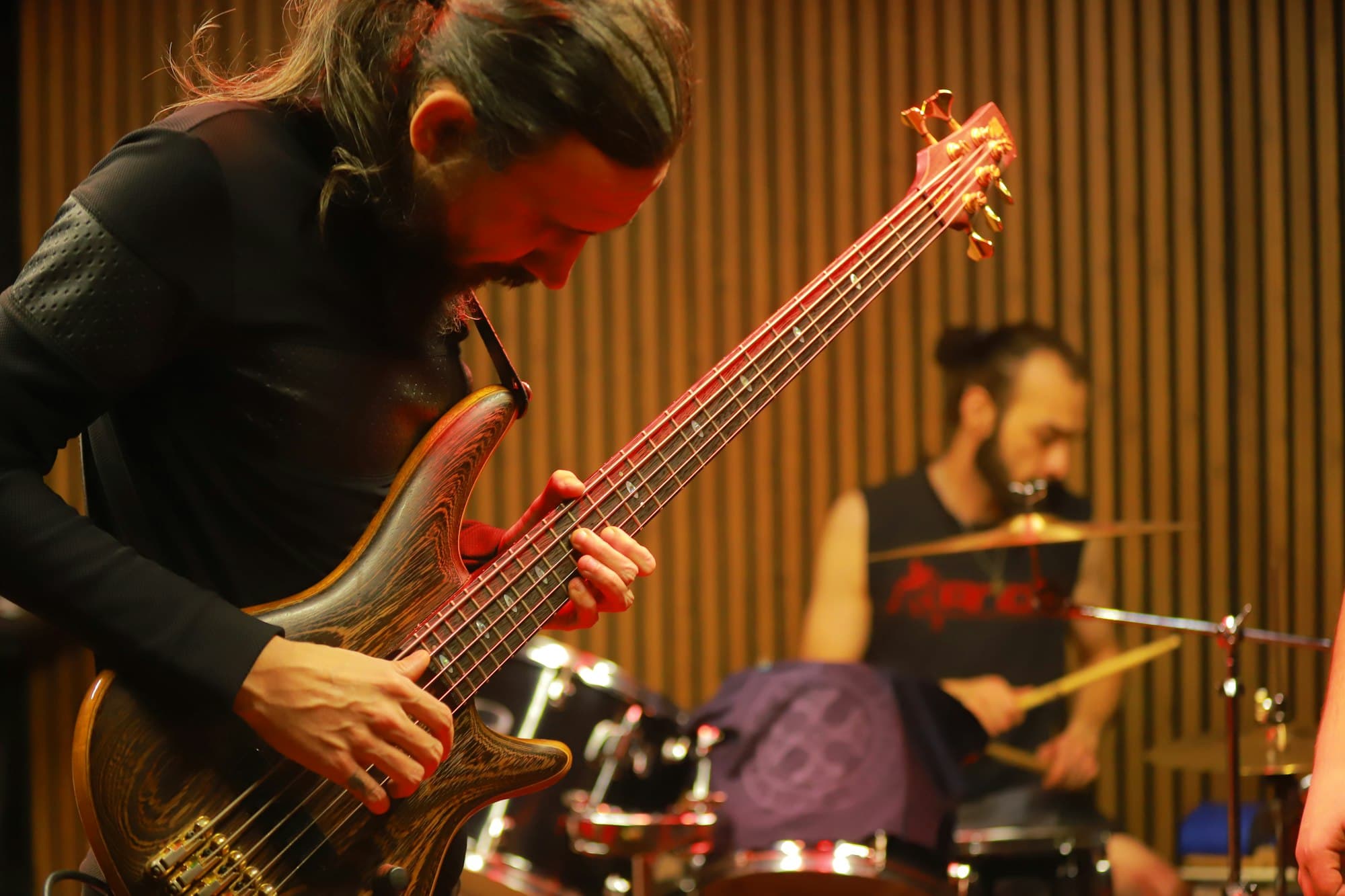 Musicians playing together in a studio